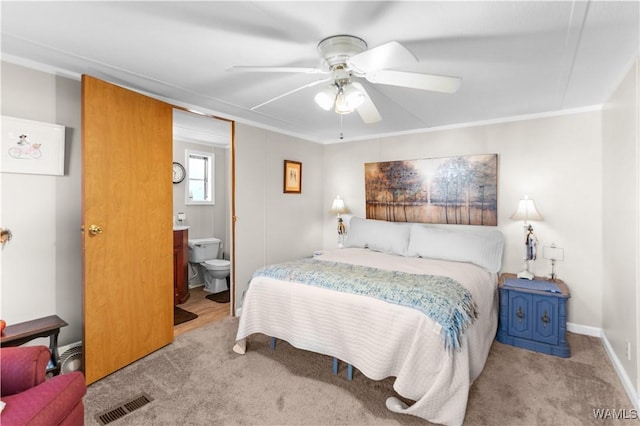2194 Oak Village Rd, Akron, AL 35441 - bedroom with carpet, ornamental molding, ensuite bath, and a ceiling fan