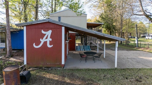 2194 Oak Village Rd, Akron, AL 35441 - view of outbuilding featuring stairway