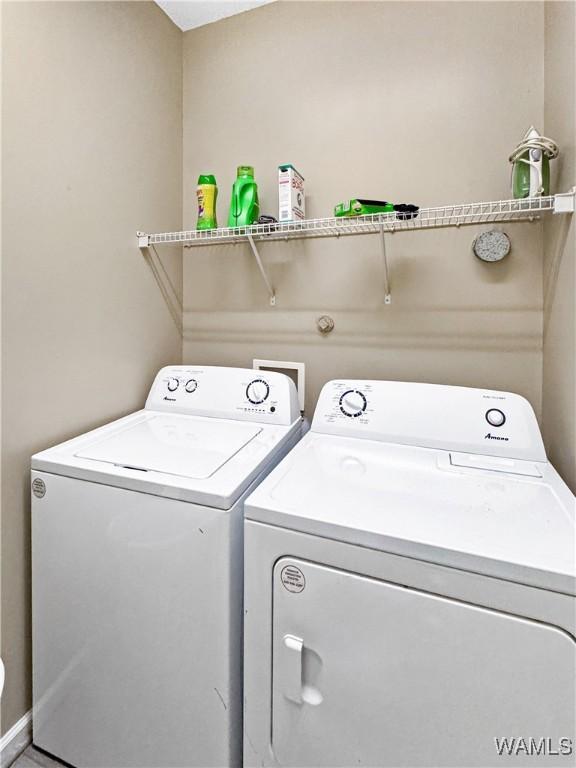 1902 45th Ave, Northport, AL 35476 - clothes washing area with laundry area and washer and clothes dryer