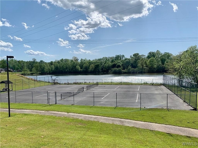 1902 45th Ave, Northport, AL 35476 - view of sport court with a water view, a yard, a forest view, and fence