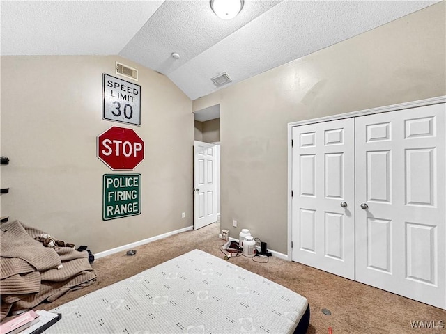 1902 45th Ave, Northport, AL 35476 - bedroom with lofted ceiling, carpet floors, visible vents, and baseboards