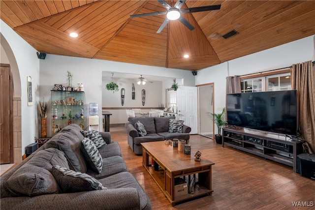 living room with hardwood / wood-style floors, wooden ceiling, and a high ceiling