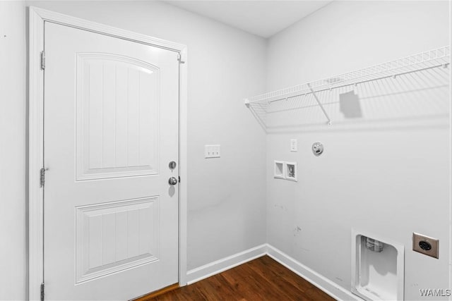 washroom featuring dark wood-style flooring, hookup for a washing machine, hookup for an electric dryer, laundry area, and baseboards