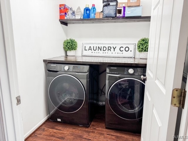 laundry room featuring separate washer and dryer and dark wood-type flooring