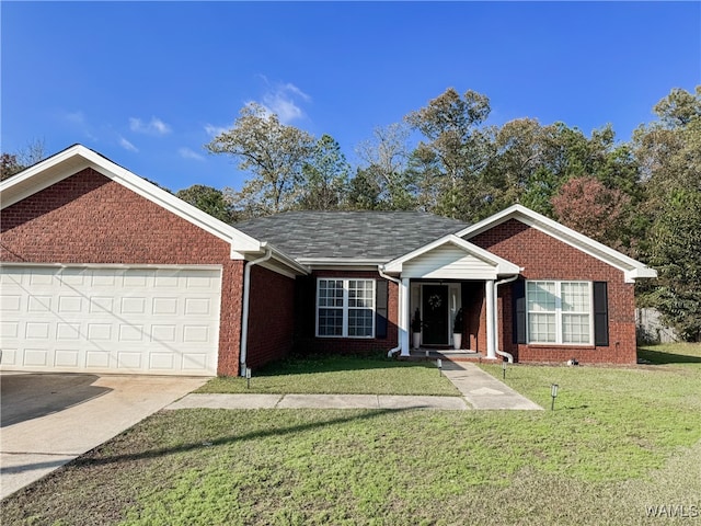 ranch-style house with a garage and a front lawn