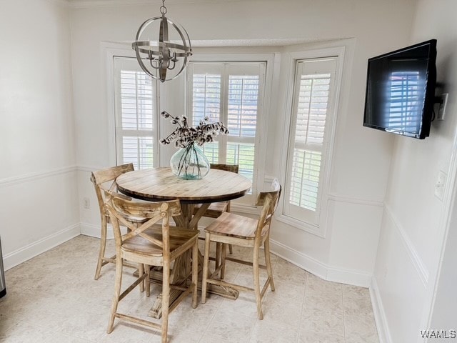 dining room featuring a chandelier