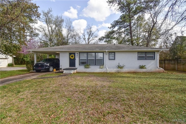 single story home with a carport, driveway, a front yard, and fence