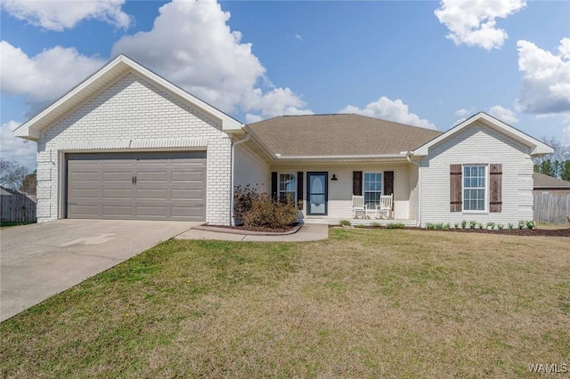 ranch-style home featuring a garage, brick siding, concrete driveway, and a front yard