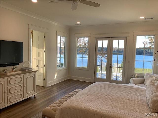 bedroom featuring crown molding, a water view, access to outside, ceiling fan, and dark hardwood / wood-style floors