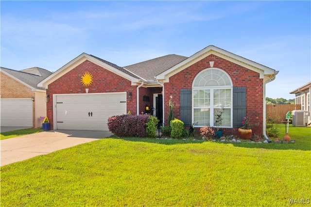 4468 21st St, Northport, AL 35476 - ranch-style home with central AC, brick siding, a garage, and concrete driveway
