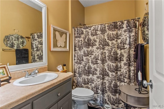 4468 21st St, Northport, AL 35476 - bathroom with vanity, toilet, and a shower with curtain