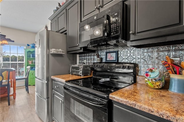 4468 21st St, Northport, AL 35476 - kitchen with black appliances, decorative backsplash, light wood-type flooring, light countertops, and gray cabinets