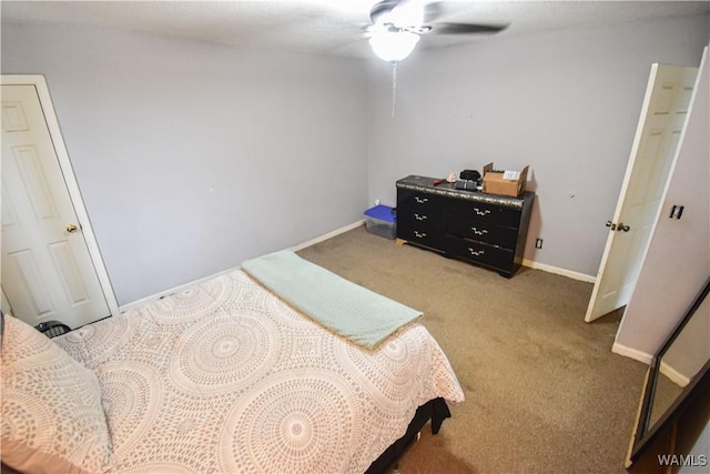 bedroom with ceiling fan and carpet