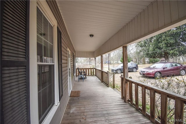 wooden terrace with covered porch