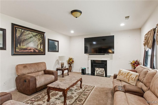 living room featuring light carpet