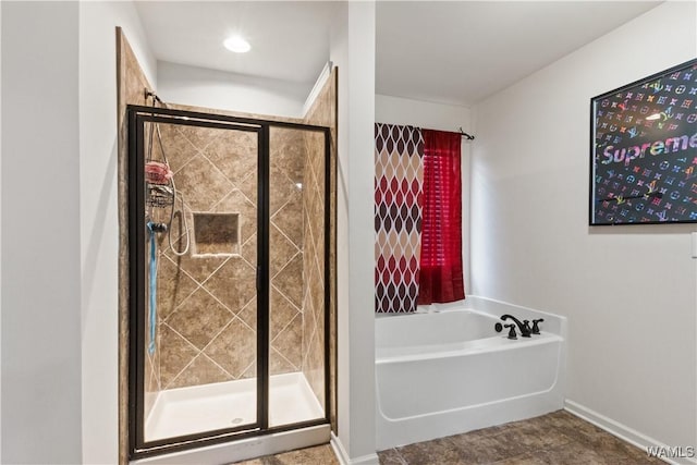 bathroom featuring plus walk in shower