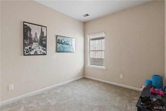 view of carpeted spare room