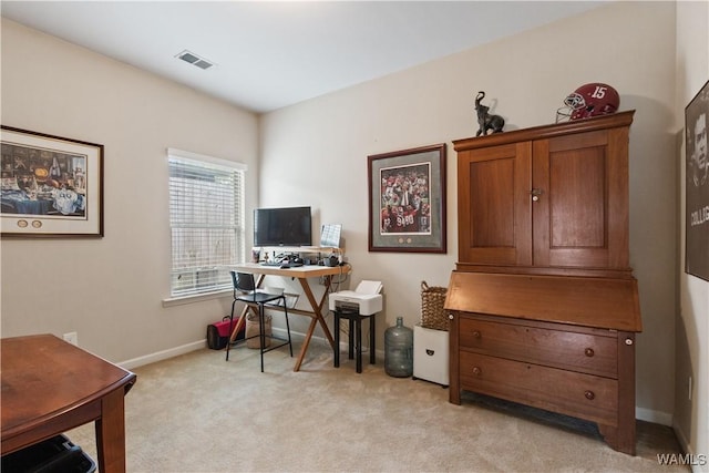 home office with light colored carpet