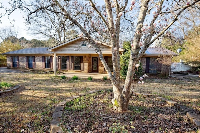 view of front of home with brick siding