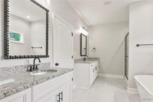 full bath featuring baseboards, visible vents, a soaking tub, a shower stall, and a sink