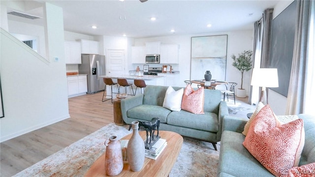 9349 Havenridge Loop, Tuscaloosa, AL 35405 - living area with light wood-style floors, recessed lighting, and baseboards