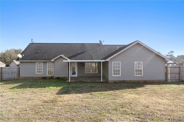 view of front of property with a front lawn