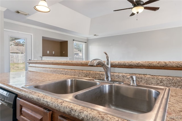 kitchen featuring plenty of natural light, dishwasher, ornamental molding, and sink