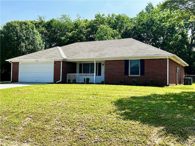 single story home featuring a porch, a garage, brick siding, concrete driveway, and a front yard