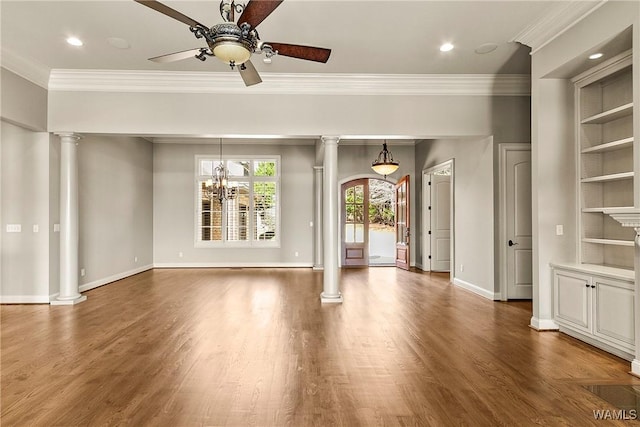 10416 Harbourtowne Dr, Northport, AL 35475 - unfurnished living room featuring ornate columns, a ceiling fan, ornamental molding, wood finished floors, and recessed lighting