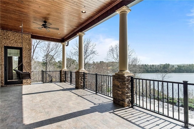 10416 Harbourtowne Dr, Northport, AL 35475 - view of patio / terrace with a water view and a ceiling fan
