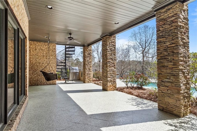 10416 Harbourtowne Dr, Northport, AL 35475 - view of patio with a ceiling fan and stairs