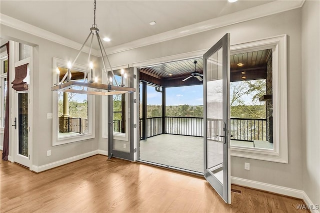 10416 Harbourtowne Dr, Northport, AL 35475 - doorway featuring crown molding, wood finished floors, ceiling fan, a water view, and recessed lighting