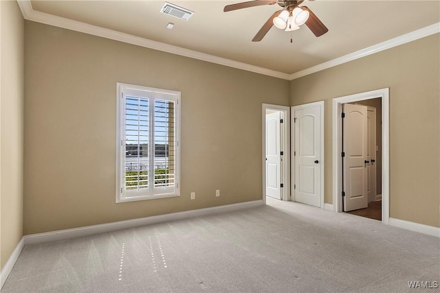 10416 Harbourtowne Dr, Northport, AL 35475 - unfurnished bedroom featuring carpet flooring, crown molding, and a ceiling fan