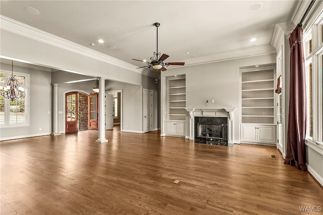 10416 Harbourtowne Dr, Northport, AL 35475 - unfurnished living room with decorative columns, a ceiling fan, ornamental molding, built in features, and recessed lighting