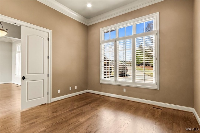 10416 Harbourtowne Dr, Northport, AL 35475 - spare room with ornamental molding and wood finished floors