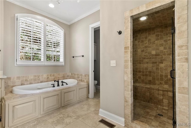 10416 Harbourtowne Dr, Northport, AL 35475 - bathroom featuring a bath, a shower stall, ornamental molding, tile patterned flooring, and recessed lighting