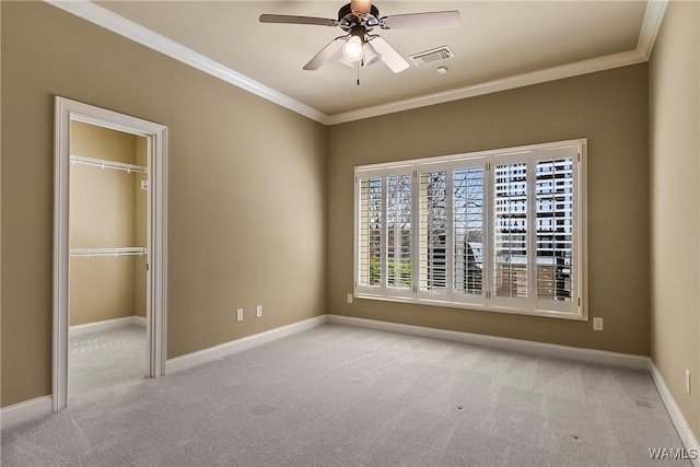 10416 Harbourtowne Dr, Northport, AL 35475 - unfurnished bedroom featuring carpet flooring, crown molding, a closet, and ceiling fan