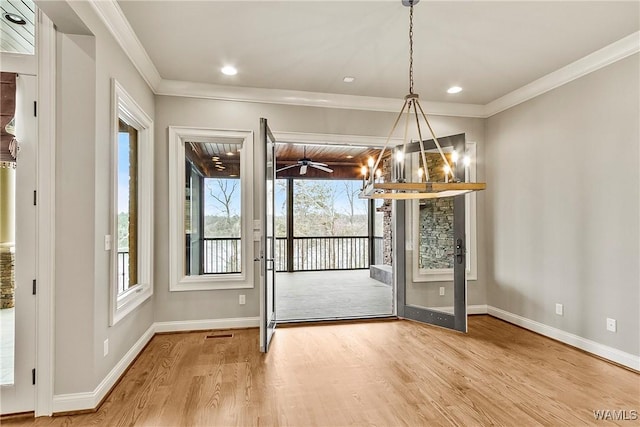 10416 Harbourtowne Dr, Northport, AL 35475 - unfurnished dining area with wood finished floors, ornamental molding, and recessed lighting