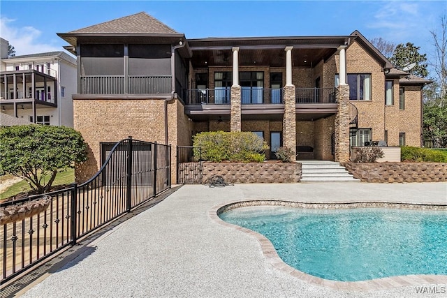 10416 Harbourtowne Dr, Northport, AL 35475 - swimming pool with a gate and a patio area
