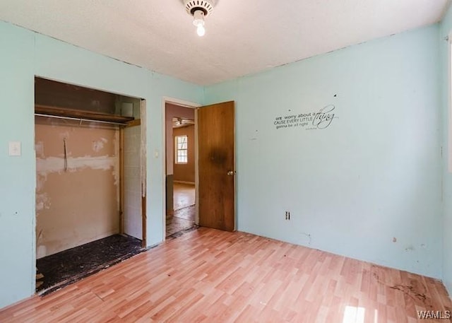 120 John Watkins Ln, Dora, AL 35062 - unfurnished bedroom with a closet and wood finished floors