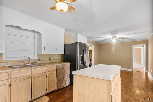 kitchen with sink, dark hardwood / wood-style flooring, stainless steel refrigerator with ice dispenser, light brown cabinetry, and a kitchen island