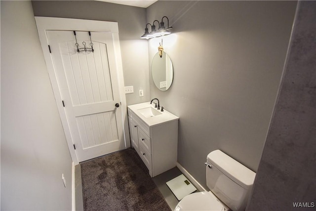 15337 Strawberry Ln, Northport, AL 35475 - bathroom with vanity, baseboards, and toilet