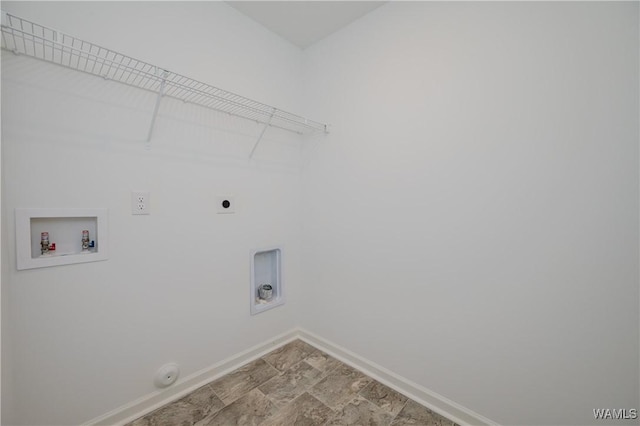 clothes washing area with hookup for a gas dryer, washer hookup, and electric dryer hookup