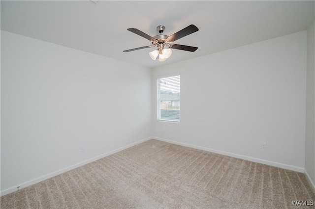 unfurnished room with carpet and ceiling fan