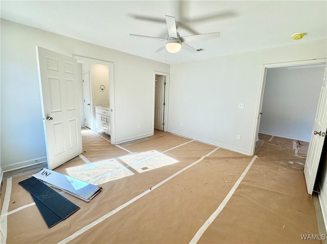 unfurnished bedroom featuring connected bathroom and ceiling fan