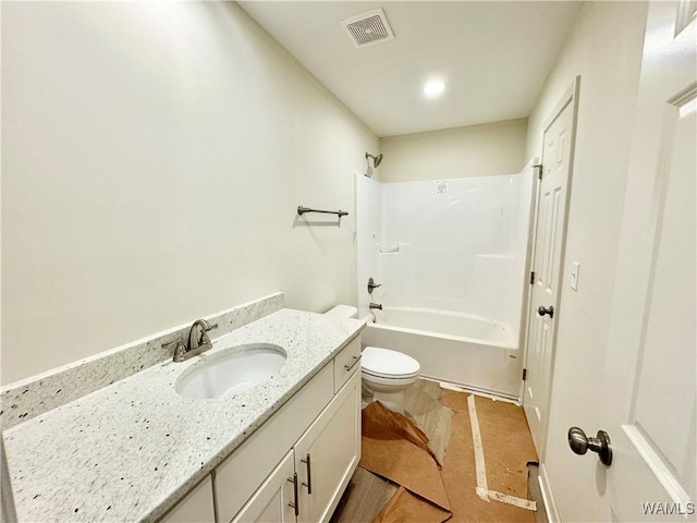 full bathroom with vanity, shower / bathtub combination, and toilet