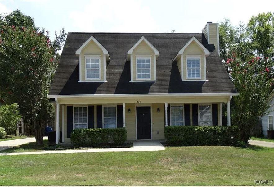 1949 Riva Ridge Rd, Helena, AL 35080 - cape cod-style house with a front lawn, a chimney, and covered porch