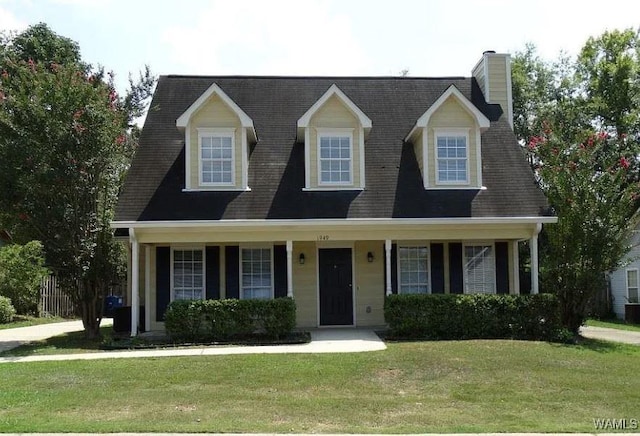 1949 Riva Ridge Rd, Helena, AL 35080 - cape cod-style house with a front lawn, a chimney, and covered porch