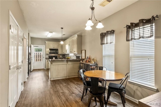 4458 19th St, Northport, AL 35476 - dining room with dark wood finished floors and baseboards