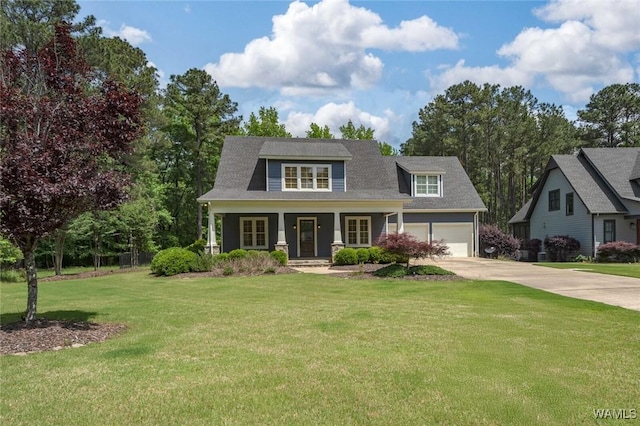 view of front of house featuring a porch, a front lawn, and concrete driveway